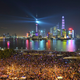 People watch a light show before a stampede incident occurred at the New Year's celebration on the Bund, a waterfront area in central Shanghai December 31,